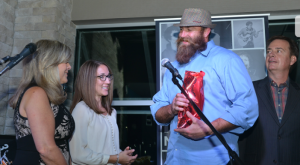 Brett and Sarah Keisel and Heath and Katie Miller were awarded the Bid for Hope award from A Glimmer of Hope for their support.  Photo: Gary Yon Photography